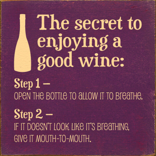 A wine bottle is shown with instructions for how to drink.