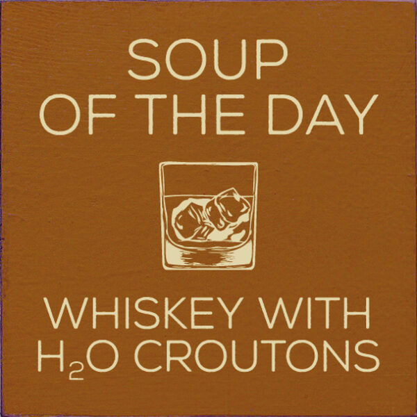 A brown square with the words soup of the day and whiskey with h 2 o croutons.